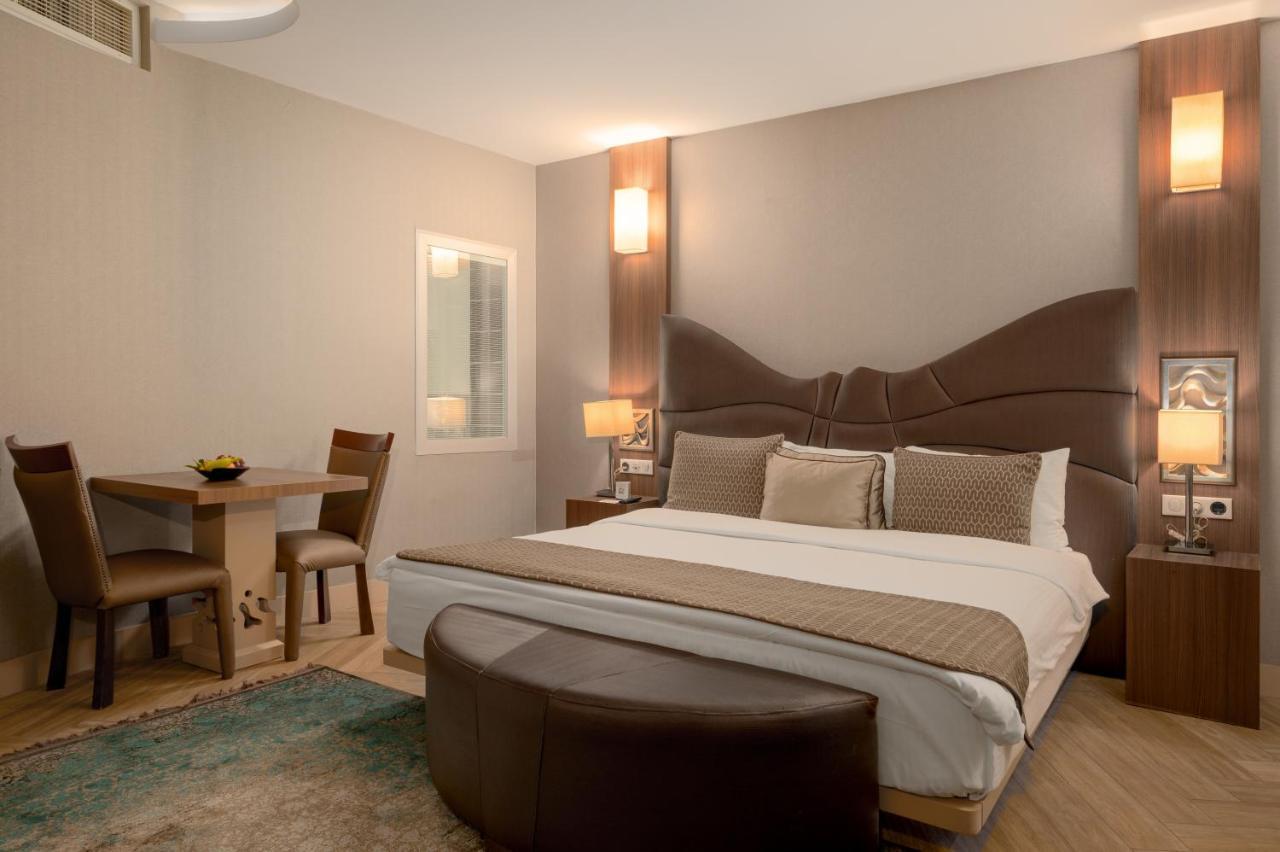 Titanic Hotel & Spa Sulaymaniyah Ngoại thất bức ảnh A bedroom at the hotel