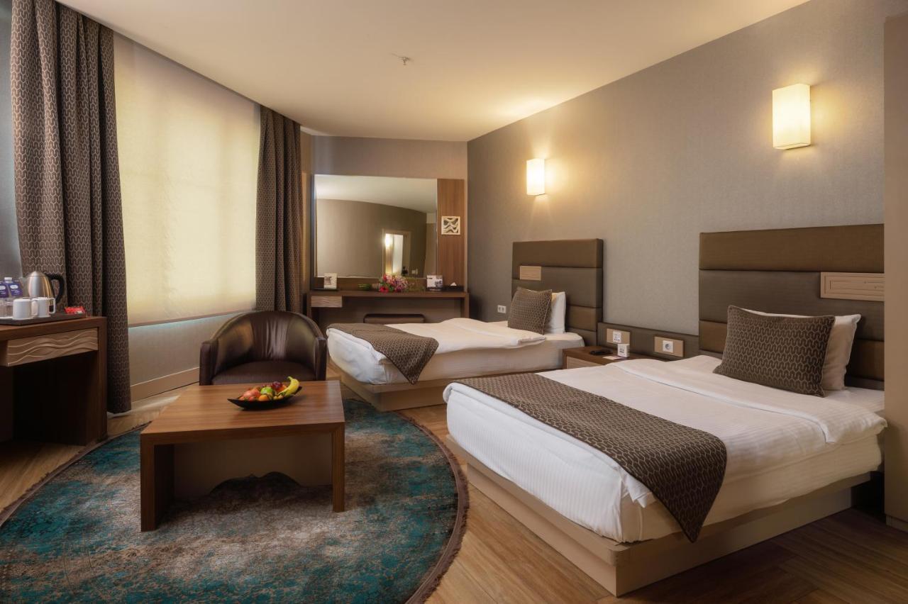 Titanic Hotel & Spa Sulaymaniyah Ngoại thất bức ảnh A room at the hotel