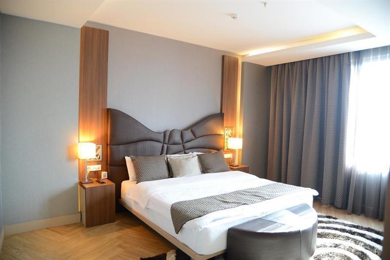 Titanic Hotel & Spa Sulaymaniyah Ngoại thất bức ảnh A bedroom at the hotel